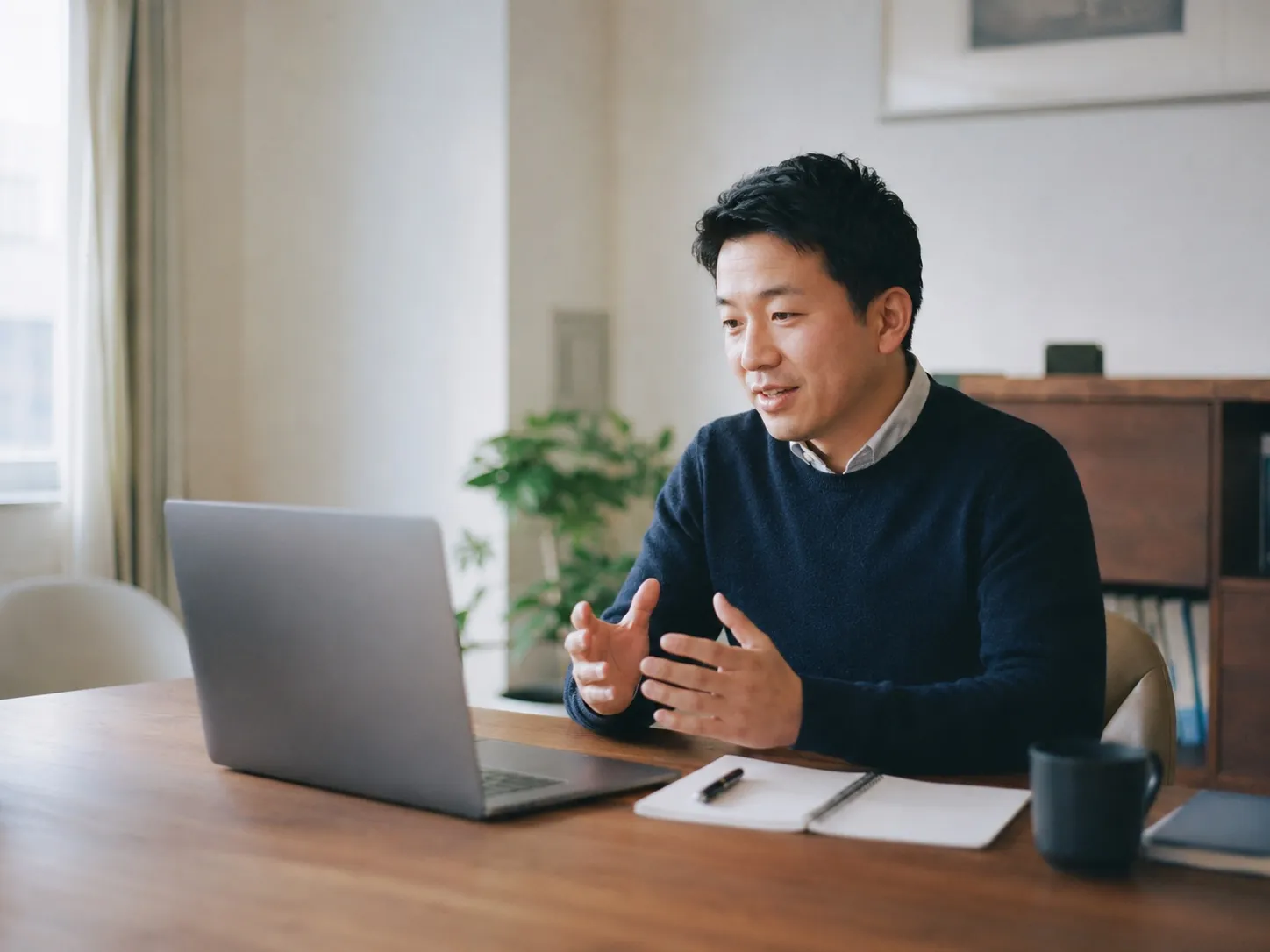 A GSOS partnerships counsellor on a friendly video onboarding call from a tidy office